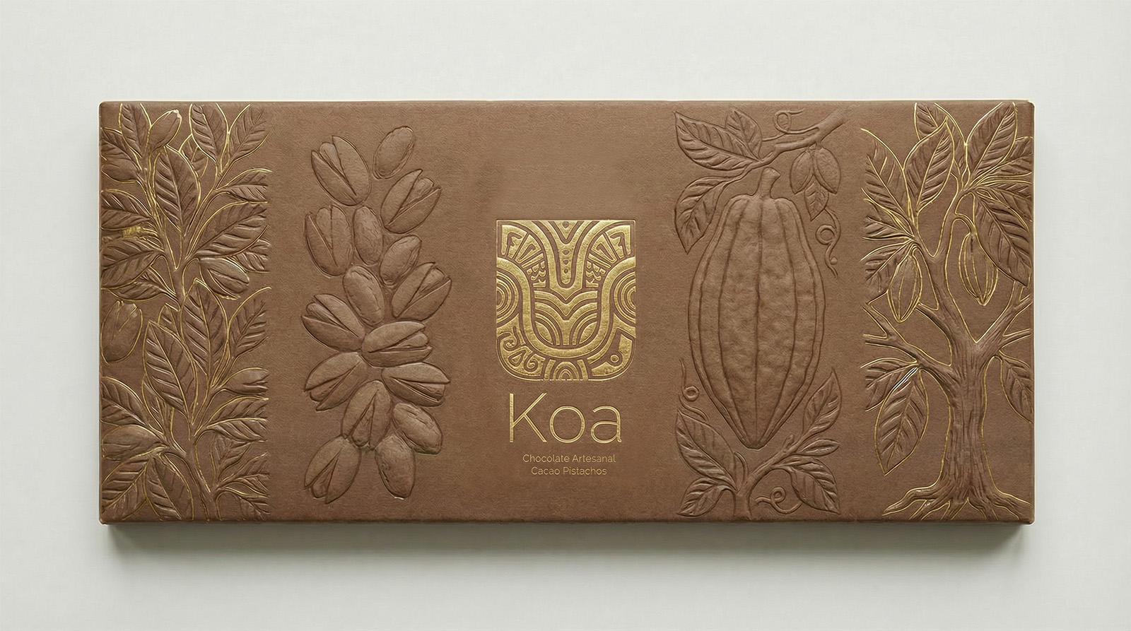 Koa chocolate bar packaging, engraved with cacao and pistachio motifs